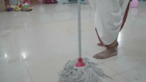 Religious man cleaning the floor Stock Footage 60658606