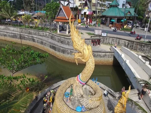 Religious monument in the form of a dragon, on the beach of the island Phuket Stock Footage 82149467