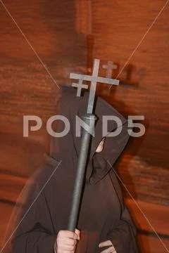 Religious people walking in procession for the Holy Week Semana Santa in Spa Stock Photos