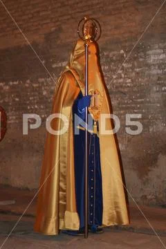 Religious people walking in procession for the Holy Week Semana Santa in Spa Stock Photos