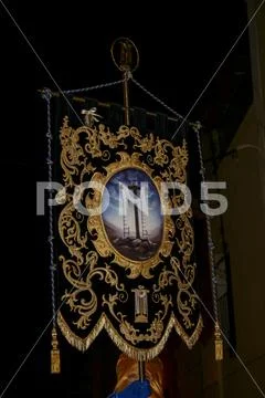 Religious people walking in procession for the Holy Week Semana Santa in Spa Stock Photos