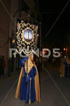 Religious people walking in procession for the Holy Week Semana Santa in Spa Stock Photos