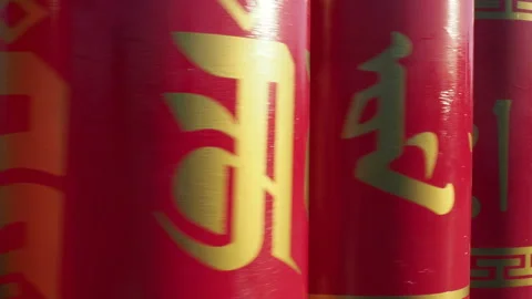 Religious red prayer wheels rotate Stock Footage 130347012