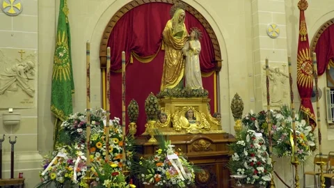 Religious statue of Saint Anne and the Virgin Mary as a child inside the Stock Footage 308228295