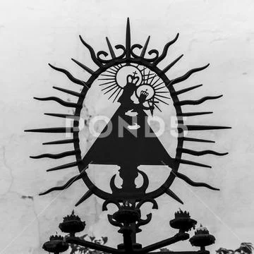 Religious, symbolic metal art on a candle holder,Cordoba, Andalusia, Spain Stock Photos