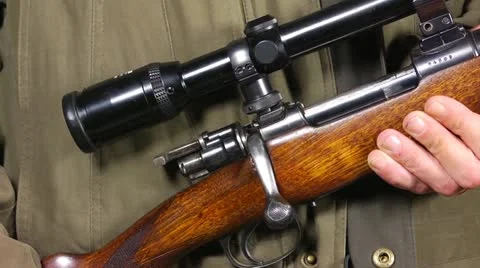 Reloading a bolt action rifle Stock Footage 12150326