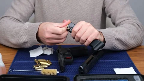 Reloading bullets magazine Stock Footage 260725071