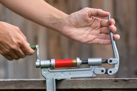 Reloading cartridge by shotgun shell reloader Stock Photos