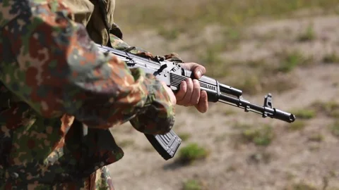 Reloading rifle close-up. The military is doing his duty Stock Footage 115335216