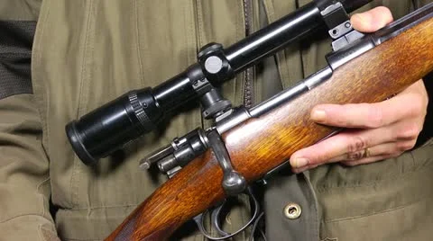 Reloading a rifle Stock Footage 12150318