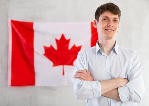 Relocation, immigration and study abroad concept - positive student on Canada Foto stock
