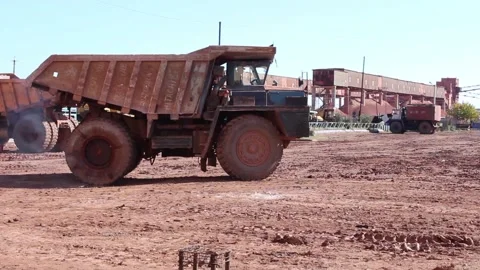 Rem 027The driver tries to set off on a huge mining truck after repair. Stock Footage 124576581