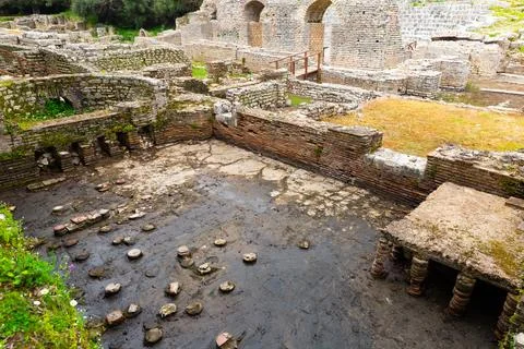 Remained architectural elements of Roman Baths in Butrint, Albania Fotos de archivo