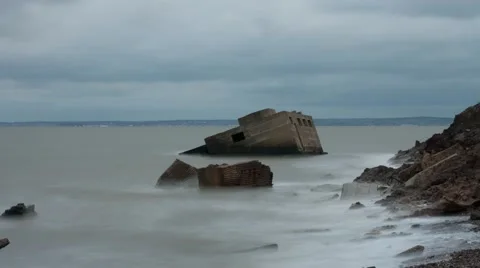 Remains of a concrete second wold war battery post.  Isle of Sheppey Timelapse Stock Footage 66235454