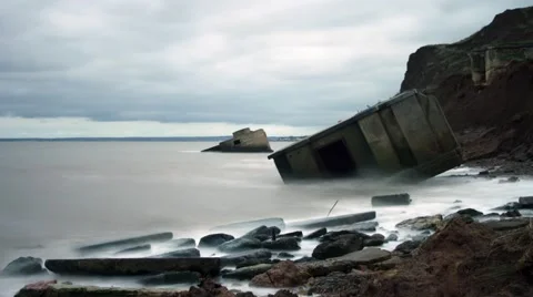 Remains of a concrete second wold war battery post.  Isle of Sheppey Timelapse Stock Footage 66235808