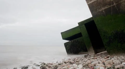 Remains of a concrete second wold war battery post.  Isle of Sheppey Timelapse Stock Footage 66235881