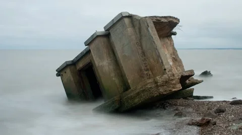 Remains of a concrete second wold war battery post.  Isle of Sheppey Timelapse Stock Footage 66237094