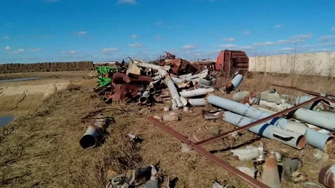 Remains of exploded ammunition, shells of multiple launch rocket systems Stock Footage 313365126
