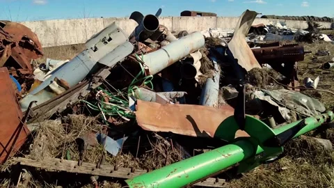 Remains of exploded ammunition, shells of multiple launch rocket systems Stock Footage 313365135