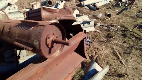 Remains of exploded ammunition, shells of multiple launch rocket systems Stock Footage 313365145