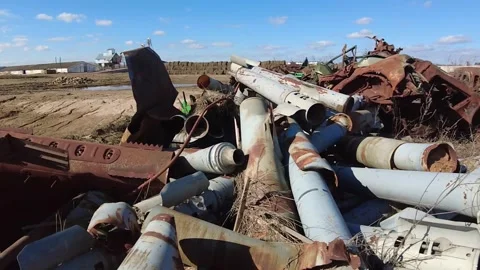 Remains of exploded ammunition, shells of multiple launch rocket systems Stock Footage 313365160