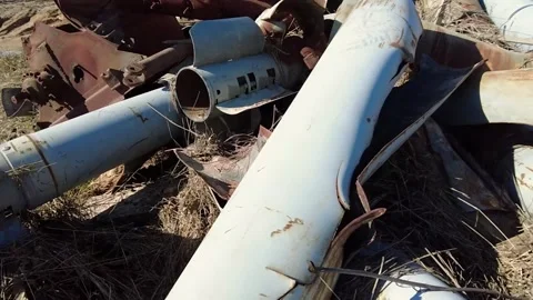 Remains of exploded ammunition, shells of multiple launch rocket systems Stock Footage 313365162