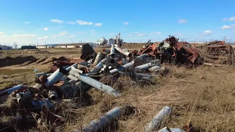 Remains of exploded ammunition, shells of multiple launch rocket systems Stock Footage 313365195