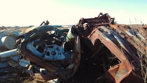 Remains of exploded ammunition, shells of multiple launch rocket systems Stock Footage 313365207