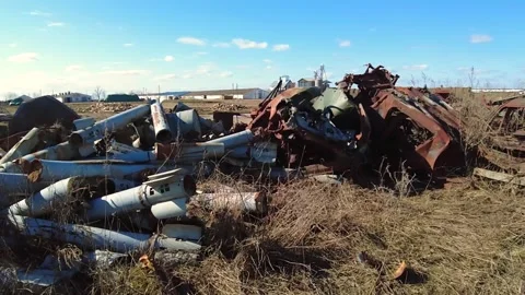 Remains of exploded ammunition, shells of multiple launch rocket systems Stock Footage 313365234