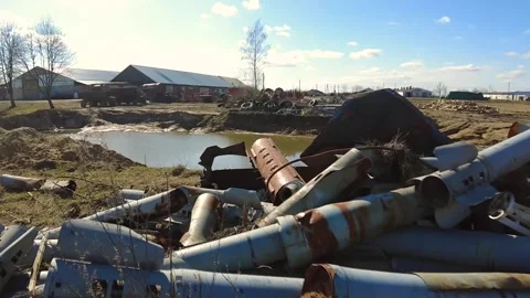Remains of exploded ammunition, shells of multiple launch rocket systems Stock Footage 313365269