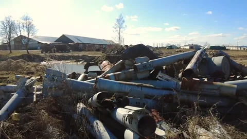 Remains of exploded ammunition, shells of multiple launch rocket systems Stock Footage 313365273