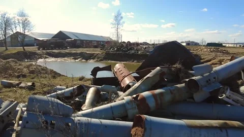 Remains of exploded ammunition, shells of multiple launch rocket systems Stock Footage 313365277