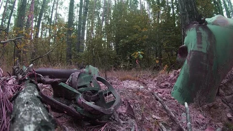 The remains of the URAGAN MLRS rocket, forest, Ukraine. 스톡 동영상 249334524