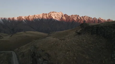 Remarkable mountain range at dusk with foreground reflecting pond Stock Footage 159054067