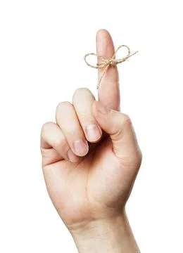 Remember! A Piece of string tied around man s index finger. Short depth of... Stock Photos