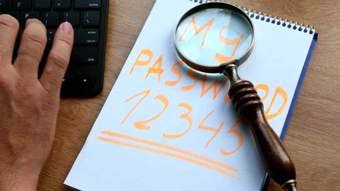 Remembering passcodes - my password written on note sheet by keyboard Video stock 138481291