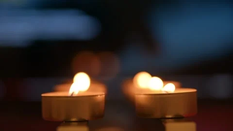 Remembrance for dead persons. Burning candles on blurred background. Footage HD. Stock Footage 147692253