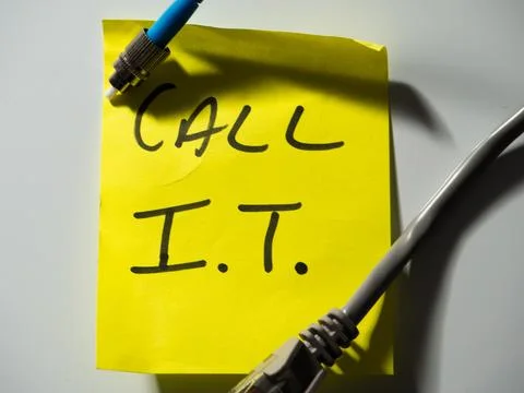 Reminder note to call network technician Stock Photos