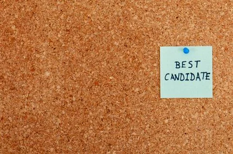 A reminder note on corkboard emphasizes selection process "Best Candidate" Stock Photos