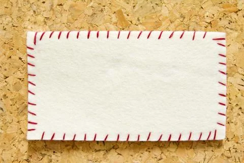 Reminder note with orange pin on corkboard Stock Photos