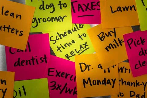 Reminder Notes Crowding Over a Schedule Time to Relax Note Stock Photos