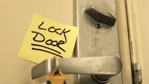 Reminder Sign To Lock The Door Stock Footage 337679308