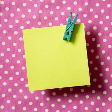 Reminder sticky notes on dot pattern fabric background Stock Photos