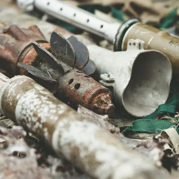 Remnants of shells anti-tank rocket propelled grenade launcher and High Mobil Stock Photos