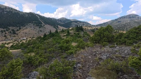 Remote Alpine Path With Drizzle and Mountain Ridge View Stock Footage 327560526