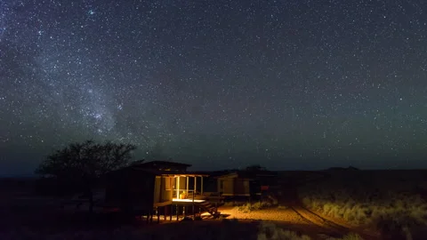Remote Cabin Under Starry Night Sky Stock Footage 303637916