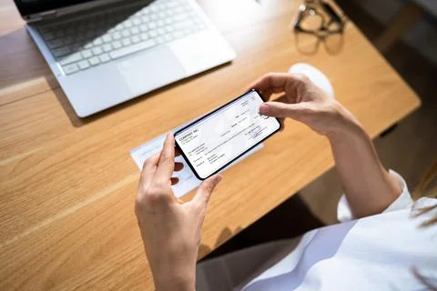 Remote Check Deposit Using Mobile Remote Stock Photos