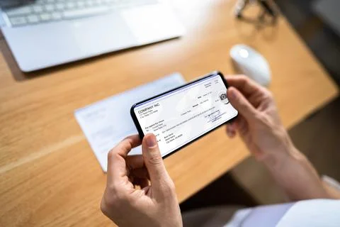 Remote Check Deposit Using Mobile Remote Stock Photos