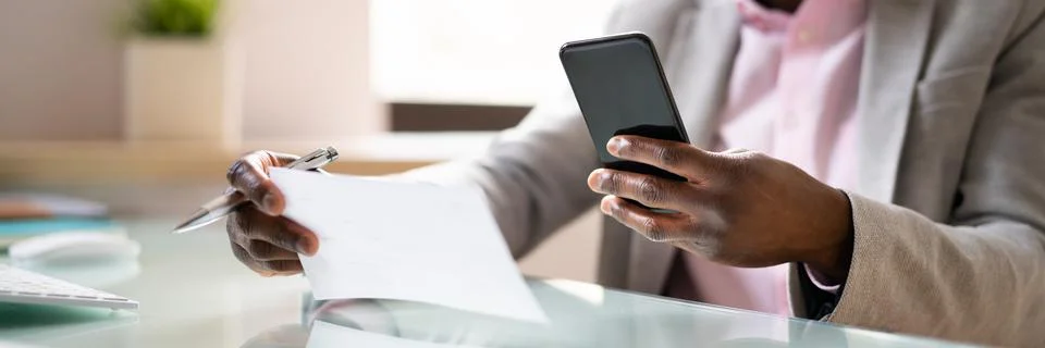 Remote Check Deposit Using Mobile Remote Stock Photos
