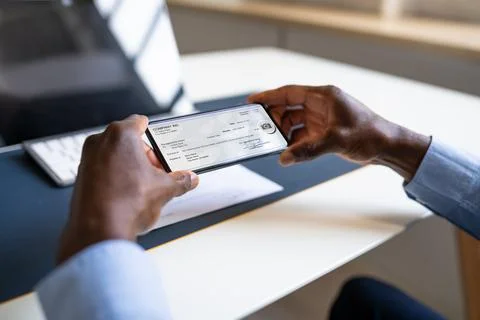 Remote Check Deposit Using Mobile Remote Stock Photos